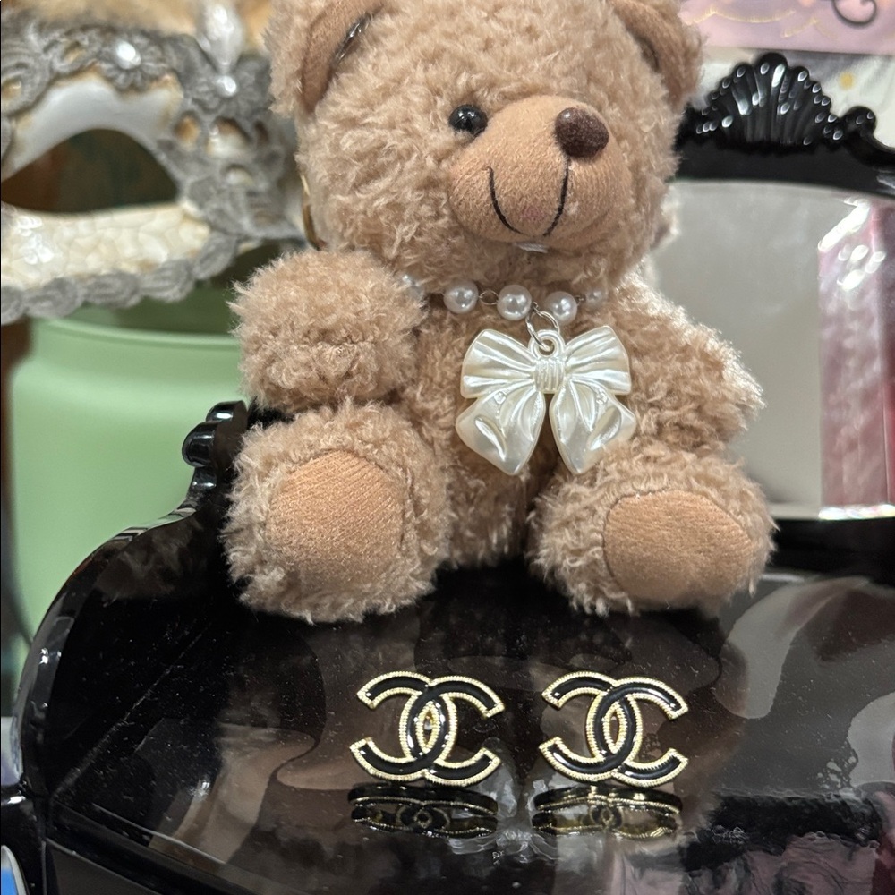 724. CC Black and Gold Stud Earrings